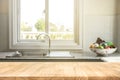 Wood table top on blur kitchen room background Royalty Free Stock Photo