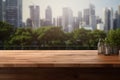 Wood table top on blur modern city background. For montage product display or design key visual layout background Royalty Free Stock Photo