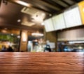 Wood table top on blurred coffee cafe vintage Royalty Free Stock Photo