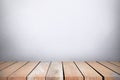 Wood table top with concrete wall background. Used for product placement or montage. Royalty Free Stock Photo