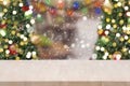 Wood table top on gold bokeh christmas tree background. Royalty Free Stock Photo