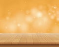 Wood table top on golden bokeh abstract background