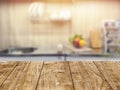 Wood table top in kitchen room blur background for montage product display or backdrop design layout