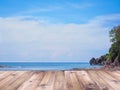 Wood table top over summer beach background. Royalty Free Stock Photo
