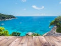 Wood table top over summer beach background. Royalty Free Stock Photo