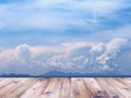 Wood table top over summer beach and blue sky Royalty Free Stock Photo