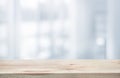 Wood table top on white abstract background form office building