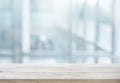 Wood table top on white abstract background form office building