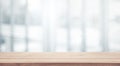 Wood table top on white abstract background form office building