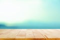 Wood table top on white blue gradient background