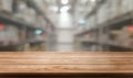 Wood table in warehouse storage blur background