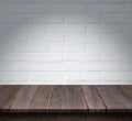 Wood table with White brick wall background Royalty Free Stock Photo