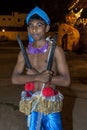 A Wood Tapper ready to perform at the Esala Perahera in Kandy, Sri Lanka.