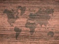 Black color world map on wooden wall background Royalty Free Stock Photo