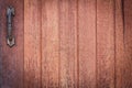 Wood texture background with old rusty metal door handle. Royalty Free Stock Photo