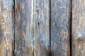 Wood texture background. View of vintage wooden door with cracks. Light brown surface of old knotted wood with natural color, Royalty Free Stock Photo
