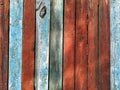 Wood texture brown and blue colors. Patterned and textures background of brightly colored panels of weathered painted wooden boar