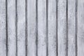 Old grunge gray wood panel with abstract grain surface texture and rusty nails, vertical striped background or backdro Royalty Free Stock Photo