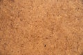 Wood texture with small dots.Pressed wood is used for making furniture. Royalty Free Stock Photo