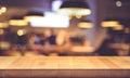 Wood texture table top counter bar with blur light gold bokeh in cafe,restaurant background.For montage product display or Royalty Free Stock Photo