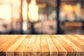 Wood texture table top counter bar with blur light gold bokeh in cafe,restaurant background Royalty Free Stock Photo