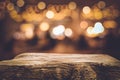 Wood texture table top counter bar with blur light gold bokeh in cafe,restaurant background Royalty Free Stock Photo