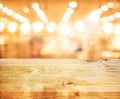 Wood texture table top counter bar with blur light gold bokeh in cafe,restaurant background Royalty Free Stock Photo