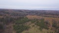 Wood and trees in autumn, aerial view, Canada. Clip. Helicopter view of an endless woodland with beautiful colors during Royalty Free Stock Photo