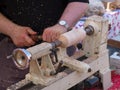 Wood turning craft on a lathe Royalty Free Stock Photo