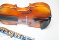 Wood violin body part with blue flute and score Royalty Free Stock Photo