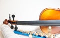 Wood violin detail with blue flute and score Royalty Free Stock Photo