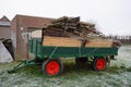 Wood on a wagon as waste or as fuel such as firewood for the fireplace or garden fire. Heat energy source. Royalty Free Stock Photo