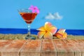 Wood walk way with cool cocktail on sea beach, Royalty Free Stock Photo