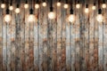 wood wall with bulb lights lamp. nice brick show room with spotlights. Royalty Free Stock Photo