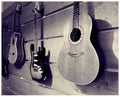 Wood Wall of Mounted Guitars on Display