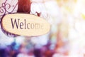 Wood welcome sign hanging. selective focus