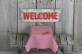 Wood welcome sign over picnic table Royalty Free Stock Photo