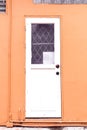 Wood white door on pink wall to creative for design and decoration