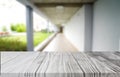 Wood white table top on blur building hall background form office building.For montage product display and design key visual Royalty Free Stock Photo