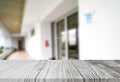 Wood white table top on blur building hall background form office building.For montage product display and design key visual Royalty Free Stock Photo