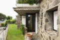 Wood windows in stone villa