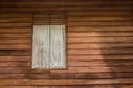 Wood windows and wood siding. Royalty Free Stock Photo