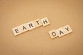 Wood word Earth Day using as background Universal day concept and Earth Day concept with copy space  for your text or design Royalty Free Stock Photo