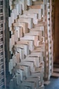 Wood working industry stack of wooden planking lath board joist table close up front view. Royalty Free Stock Photo