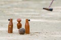 Woodball player on field with woodball gate and stick on competi