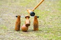 Woodball player on field with woodball gate and stick on competi