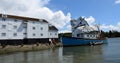 Woodbridge Quayside buildings Tide Mill and Boat Royalty Free Stock Photo