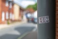 Woodbridge Suffolk UK July 07 2021: An anti vaccination sticker that has been stuck and littered around a town centre spreading
