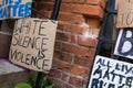 Woodbridge, Suffolk, UK June 20 2020: Homemade BLM protest signs that have been fixed to the town hall in the center of Woodbridge