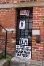 Woodbridge, Suffolk, UK June 19 2020: Homemade BLM protest signs that have been fixed to the town hall in the center of Woodbridge